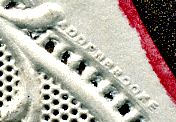 Detail of lace-paper makers name